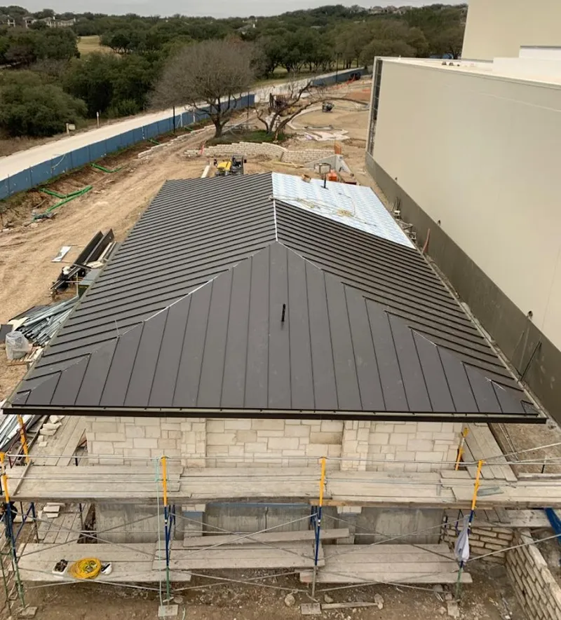 Metal roof new construction with scaffolding in Helena
